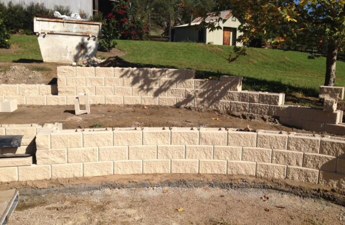Retaining & Retention Walls-Laredo TX Landscape Designs & Outdoor Living Areas-We offer Landscape Design, Outdoor Patios & Pergolas, Outdoor Living Spaces, Stonescapes, Residential & Commercial Landscaping, Irrigation Installation & Repairs, Drainage Systems, Landscape Lighting, Outdoor Living Spaces, Tree Service, Lawn Service, and more.